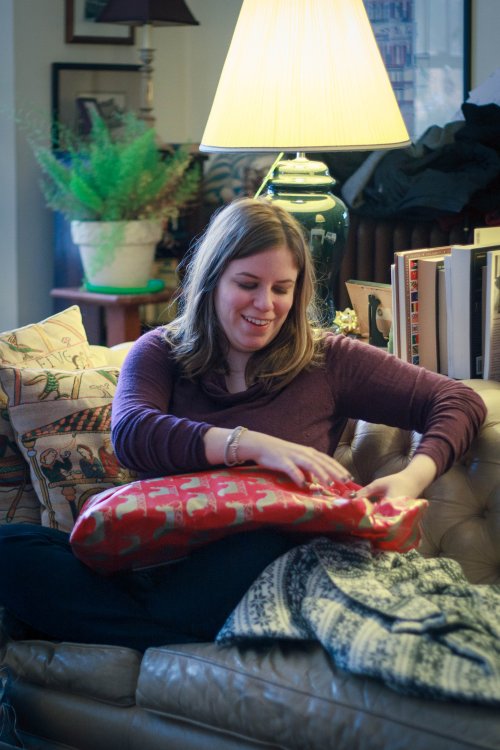 Julia Miller opening her gift